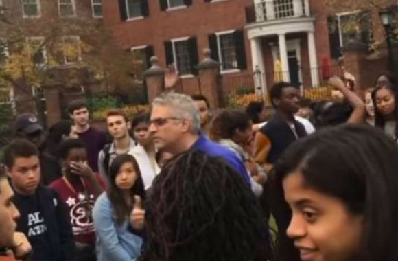 Red scarf, leather jacket, black raybans 4my man