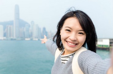 https://www.thecollegefix.com/wp-content/uploads/2016/04/smiling-asian-woman-happy-selfie.leungchopan.Shutterstock-370x242.jpg